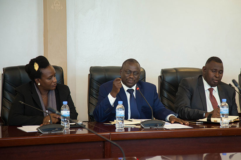 Hon. Alex Ruhunda head of Ugandan delegation (C) speaks during the meeting with MPs in parliament yesterday. Nadege Imbabazi. 