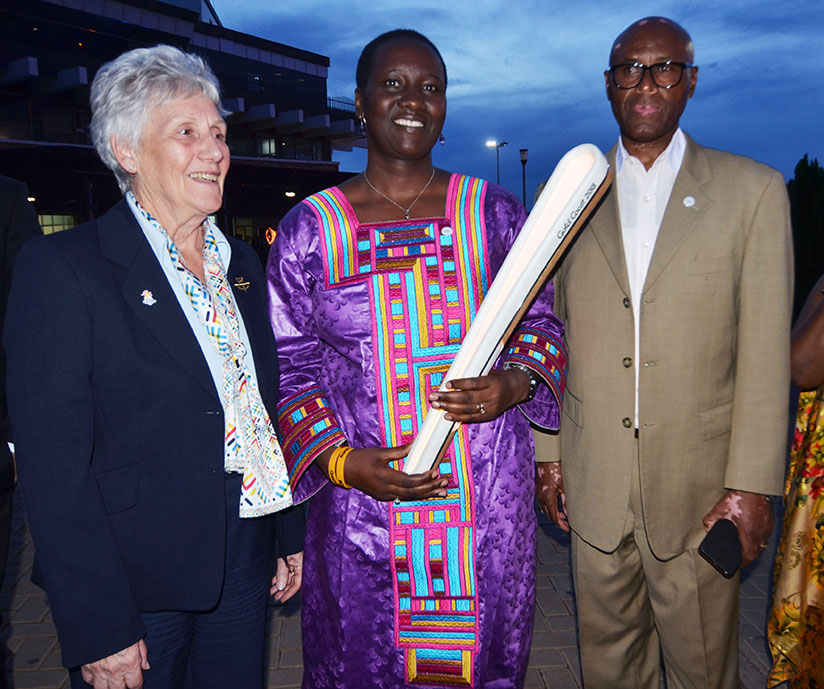 L-R: Commonwealth Games Federation President Dr Louise Martin, Minister for Sports and Culture Julienne Uwacu and National Olympic president Amb. Valens Munyabagisha pose for a pho....