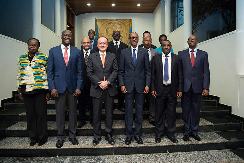 President Kagame with World Bank head Jim Yong Kim (on his right), Makhtar Sop Diop, the Bank's vice-president for Africa (second-left), Finance and Economic Planning minister Clav....