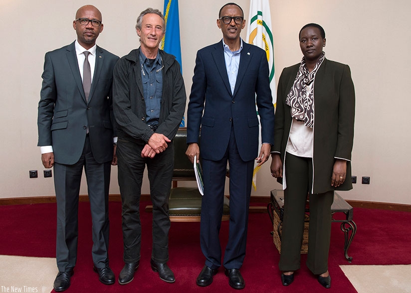 President Kagame meets with official from the Rwanda Cycling Federation; Aimable Bayingana, the president (L), and Team Rwanda technical director Jonathan Boyer (second-left), and ....