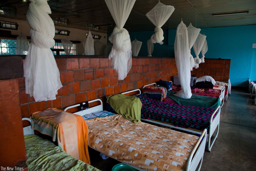 Mosquito nets hung in a dormitory at IFAK secondary school in Kimihurura. Net. 