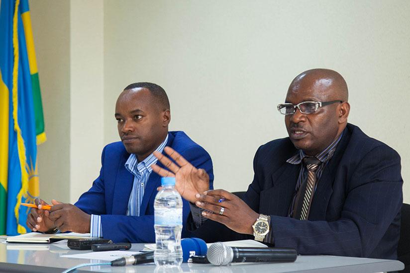 Celestin Sibomana, Director of Capacity Development in RPPA (R), and Richard Migambi speaks during the press conference in Kigali. / Nadege Imbabazi