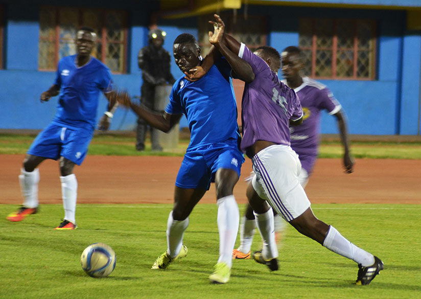 Rayon's striker Mousa Camara fights for the ball during the AS Kigali pre-season tournament at Amahoro Stadium. / Sam Ngndahimana