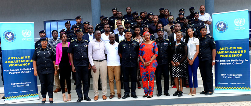 Police officers pose for a group photo with the Anti-Crime Ambassadors after their meeting on Wednesday. / Courtesy