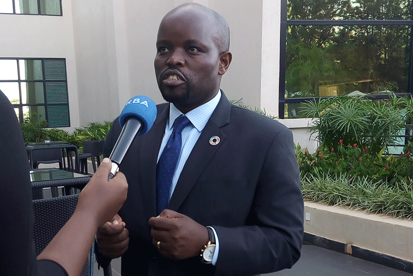 Minister Nsengimana speaking to journalist after the function (Steven Muvunyi)