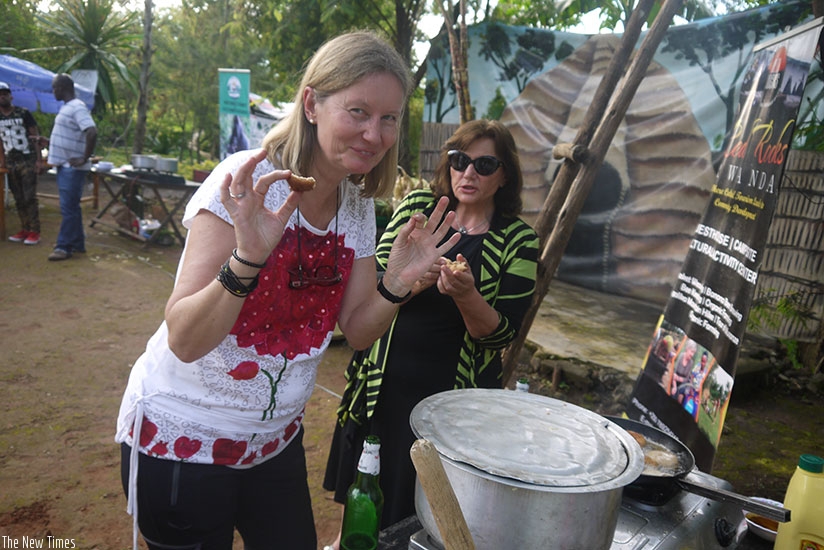 Guests enjoy snacks at the conservation event in Musanze, last Sunday. (All photos by Moses Opobo)