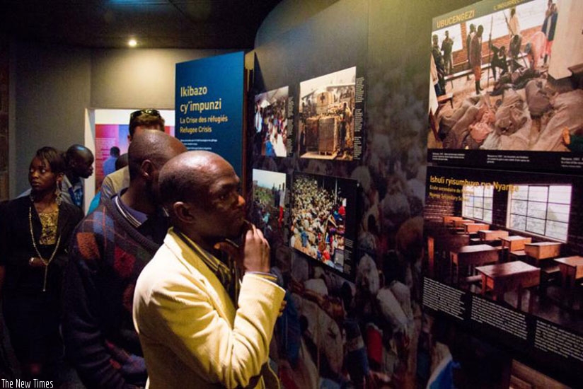 Visitors tour inside Kigali Genocide Memorial Centre in Gisozi. (File)