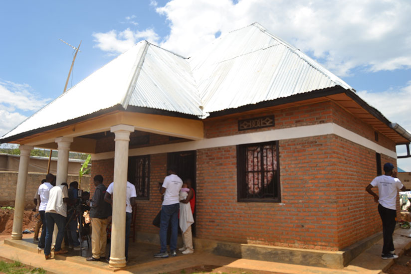 A house built by young Genocide survivors and handed to Donatille Mukakayonde, a survivor. / Jean d'Amour Mbonyinshuti