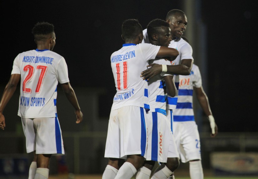 Rayon Sports' Djabel Manishimwe (c) celebrates with his teammates after he scores the fourth goal. All photos by Sam Ngendahimana.