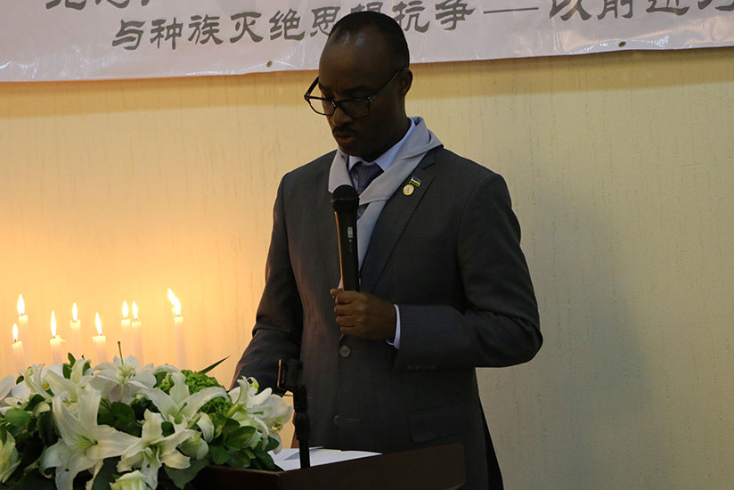 Lt. Gen. Charles Kayonga addressing mourners in China. (Courtesy photos)