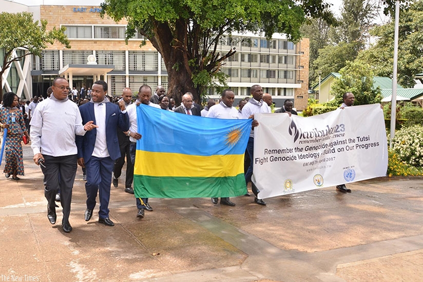 Rwandans and friends of Rwanda in Tanzania during the Walk to Remember in Tanzania, yesterday. Courtesy. 