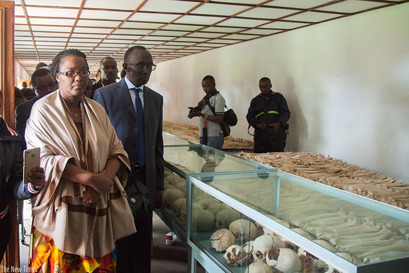 Chief Justice Sam Rugege, Dr Geraldine Mukeshimana,Minister for Agriculture and other officials look at the retrieved remains of genocide victims at Nyarubuye Genocide Memorial, in....