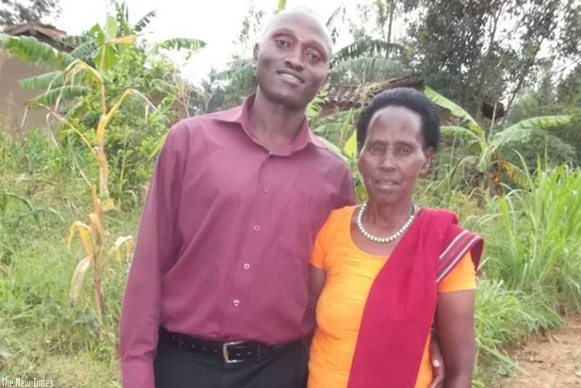 Kamanda standing next to his mother  with whom they narrowly survived death during the 1994 Genocide against the Tutsi in which his father, brother and sister were killed. Courtesy