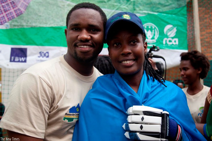 Uwamahoro poses with Eric Dusingizimana after setting the Guinness World Record. File