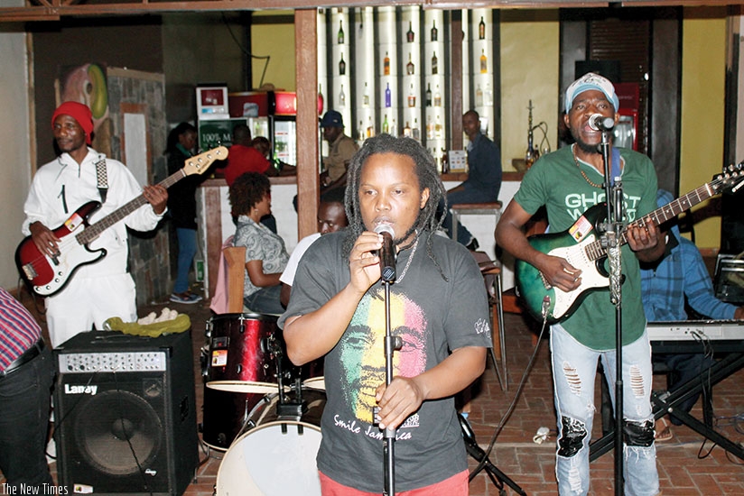 2T Reggae Man on stage with his backing band. Courtesy photos..