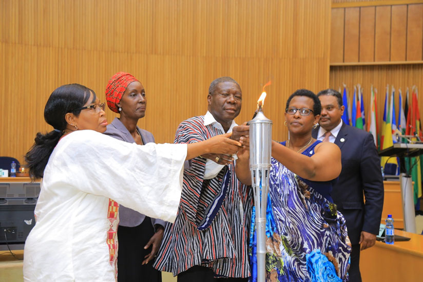 Amb. Hope Tumukunde(R), Rwanda's Permanent Representative to the African Union; Thomas Kwesi (centre), AU Deputy Chairperson; the AU Political Affairs Commissioner Samate Cessouma ....