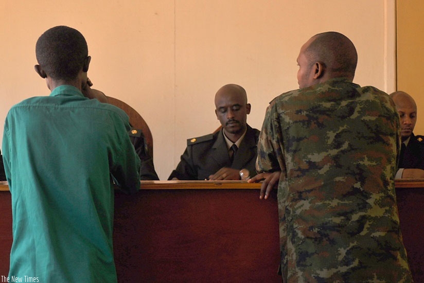 Nsanzimana and Major Rugomwa during a past court appearance. (File)