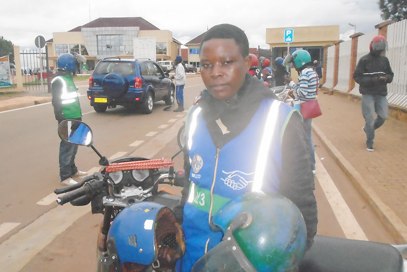 Nyirampeta, is the only female motorcyclist in the district.  (Photos by R. Niyingize)