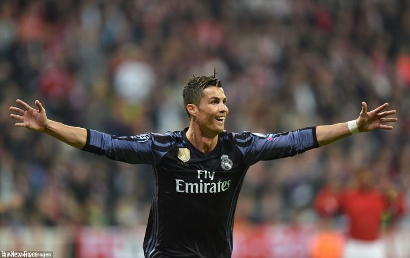 Ronaldo opens his arms after his capping a superb comeback for Real and his 100th goal in European club football