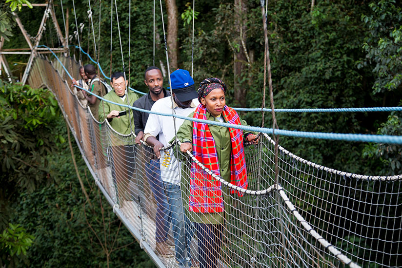 Local tourists on a160m walk on the Canopy in Nyungwe National Park during TemberuRwanda  campaign last year. Faustin Niyigena. Faustin Niyigena.
