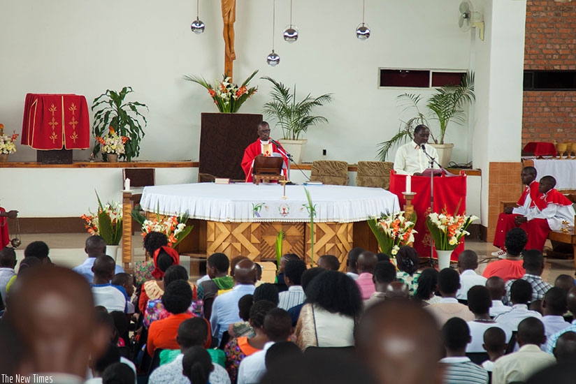 A priest preaching at Saint Michel church on Palm Sunday. Clergy from different churches have called for forgiveness as christains from all over the country celebrate the resurrect....