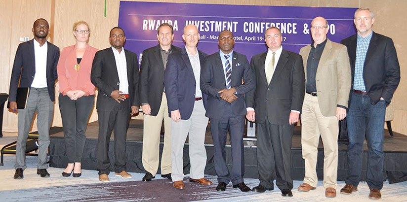 Zank (second left) and BDC officials pose for a picture with US and local investors. / Appolonia Uwanziga
