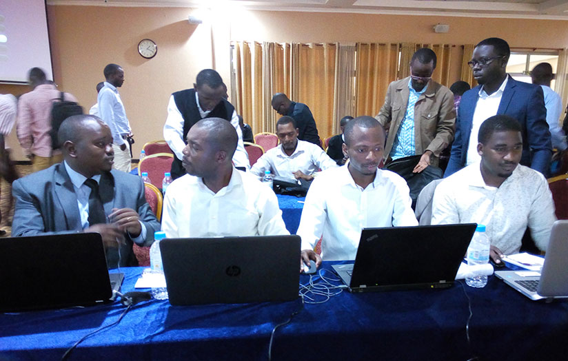 Mpabwanamaguru (left) with other architects at the end of the workshop. / Appolonia Uwanziga
