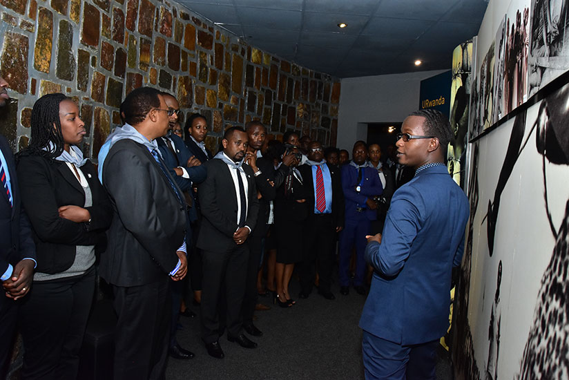 Ecobank Rwanda team inside Gisozi memorial site following the history of genocide. / Frederic Byumvuhore