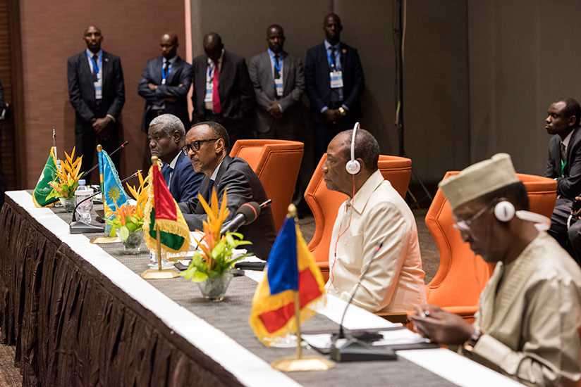 Presidents Kagame, Alpha Conde of Guinea (second-right) and Idriss Deby of Chad (right), and African Union Commission chairperson Moussa Faki Mahamat in Conakry, Guinea, yesterday,....