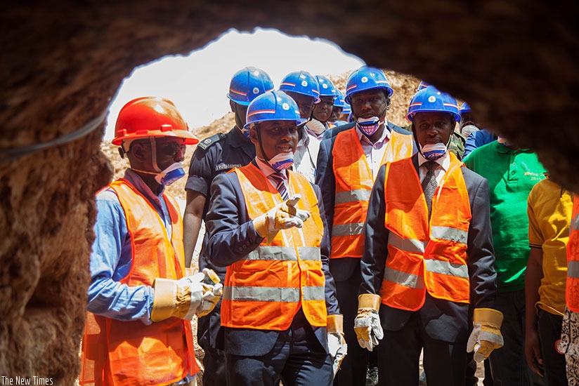 Government officials inspect COPABAMANYA mining cooperative in Nyamata during the World Day for Safety and Health at Work last week. Miners have called on their employers to give them pension benefits.  Nadege Imbabazi