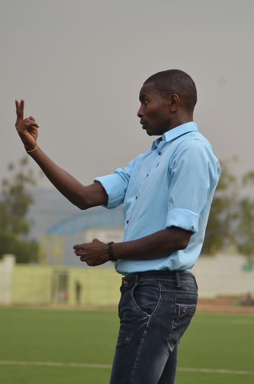 Djuma Masudi gestures on the touchline during a past match. The Rayon Sports head coach has resumed his duties after a one-week suspension. / Sam Ngendahimana