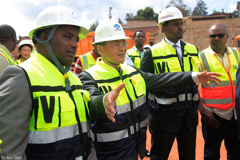 City mayor Nyamulinda (L) and Amb. Hongwei during the inspection of the construction works in Kigali. (Photos by Sam Ngendahimana)