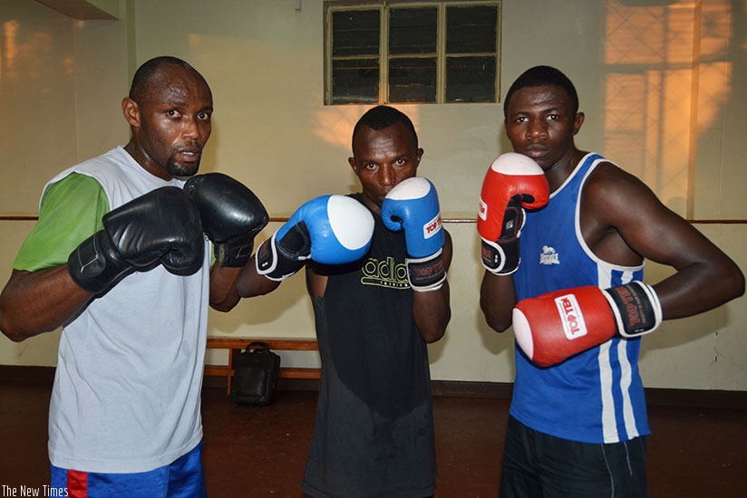 Boxers Vincent Nsengiyumva (L), David Nsabimana (C) and Jean Pierre Cyiza are part of the team that will represent Rwanda in Brazzaville. (S. Ngendahimana)