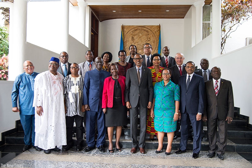 President Kagame poses for a group photo with the visiting members of the African Union Peace and Security Council in Kigali on Friday. The council members have been attending a retreat in Rwanda this week. Village Urugwiro.