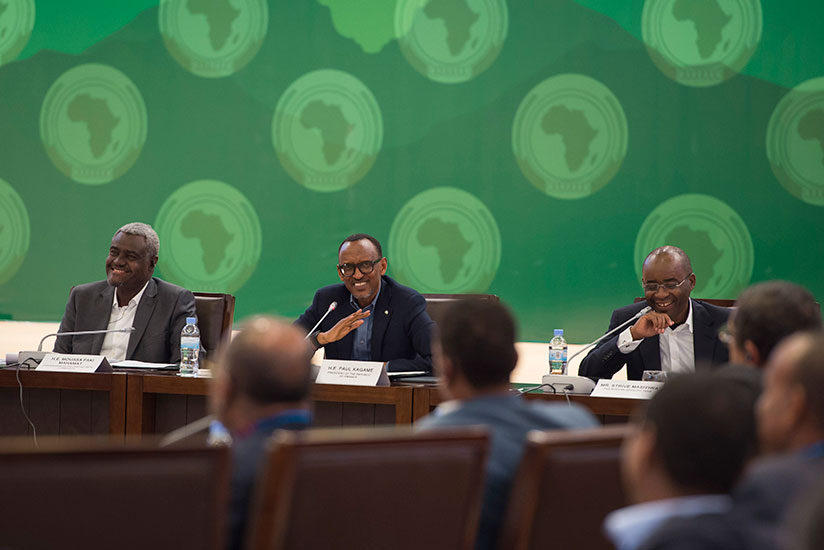 President Kagame with African Union Commission chairperson Moussa Faki Mahamat (L), and Strive Masiyiwa, a member of the Pan-African Advisory team and founder of Econet (R), at a consultative meeting on the African Union Reforms in Kigali, yesterday. / Village Urugwiro