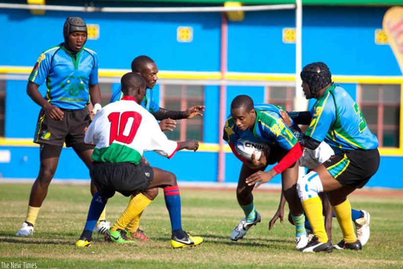 National rugby team captain Jean de Dieu Hakizimana (with the ball) in action against Burundi in CAR Cup four years ago. (File)