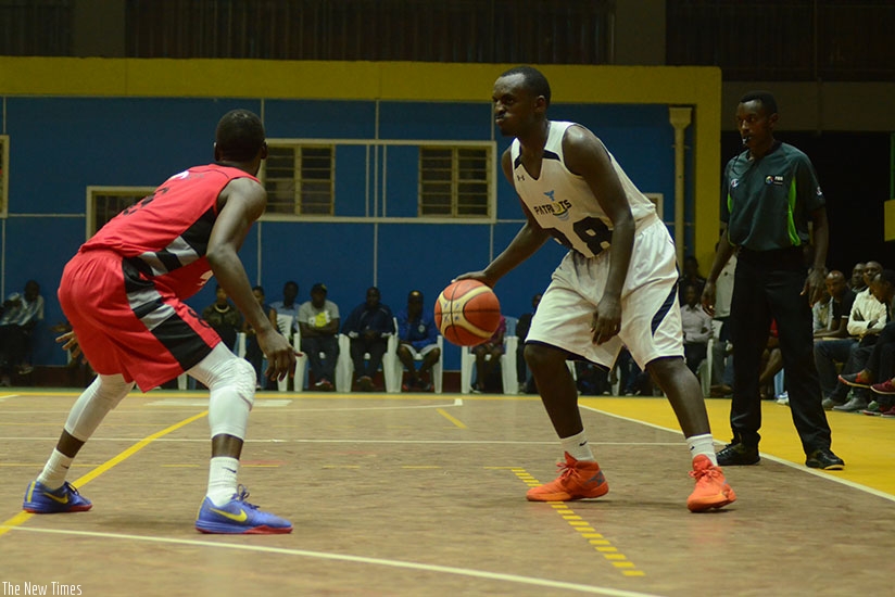National team captain Aristide Mugabe (with the ball) believes Rwanda can qualify from their group despite being the underdogs. (Sam Ngendahimana)