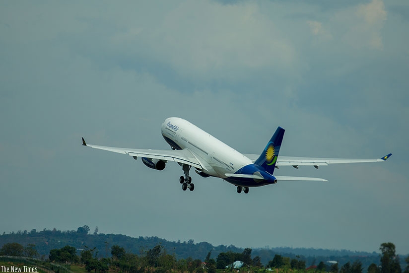 A RwandAir plane takes to the skies. Restrictions have affected the growth of the aviation sector in the region.  