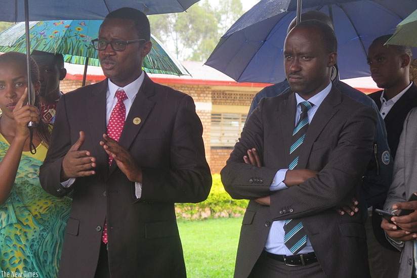 RNMU chief Gitembagara (L) and Gisagara Mayor Jerome Rutaburingoga  during the donation of cows to Genocide survivors in Kibilizi Sector. (Photos by Eddie Nsabimana)