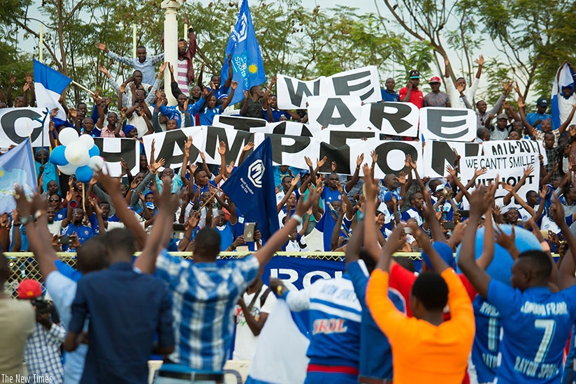 Rayon sports players and fans celebrate after beating Mukura Victory Sport to win the 2017 National Premier League yesterday. (Photos by Timothy Kisambira)