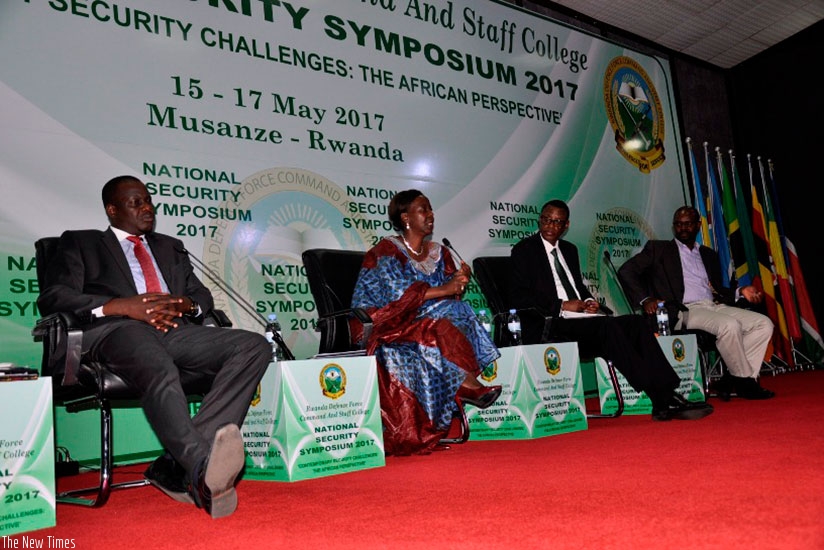 Minister Mushikiwabo, EALA Speaker Kidega and Defence Minister Kabarebe discussing at the Security symposium