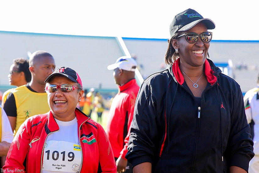 First Lady Jeannette Kagame and her Kenyan counterpart Mrs Margaret Kenyatta at the start of the 2017 Kigali International Peace Marathon yesterday. Rwandau2019s Salome Nyirarukundo made history after becoming the first Rwandan woman to win the half marathon since inception of the event in 2005.rn