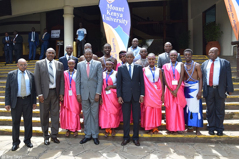 Ambassador Kimonyo (5th left) together with Mount Kenya University Rwanda Chairman and Founder Prof. Simon Gicharu, (2nd left), Kenya cabinet secretary (3rd left), Joseph Ole Nkaisery and MKU students and staff during the meeting in Nairobi. (Courtesy)