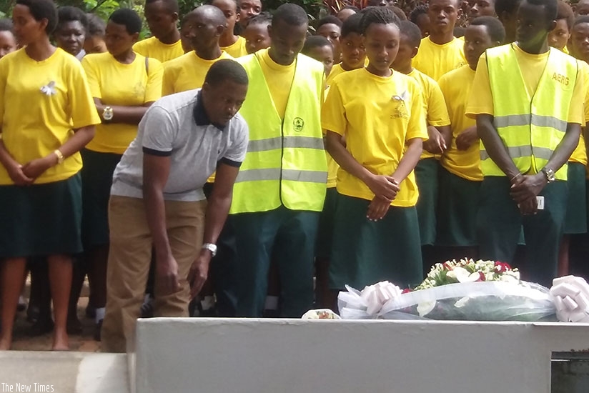 Students laying a wreath at Gisozi Genocide Memorial site in Kigali. (Francis Byaruhanga)
