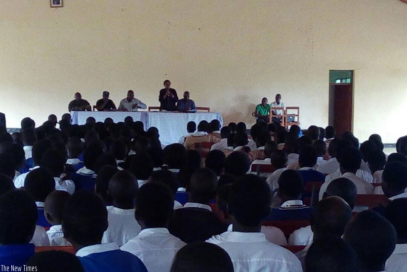 Students at Busasamana Secondary School follow the discussion by the legislators on Monday. (Courtesy)
