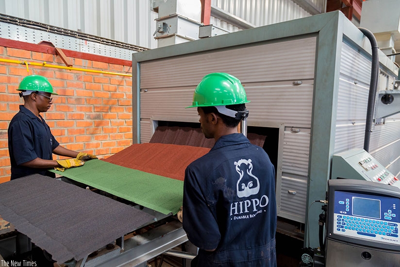 Employees of Hippo, a local firm that makes roofing materials. (File)