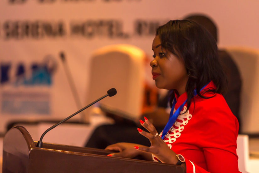 Uwitonze speaks during the summit yesterday. (Timothy Kisambira)