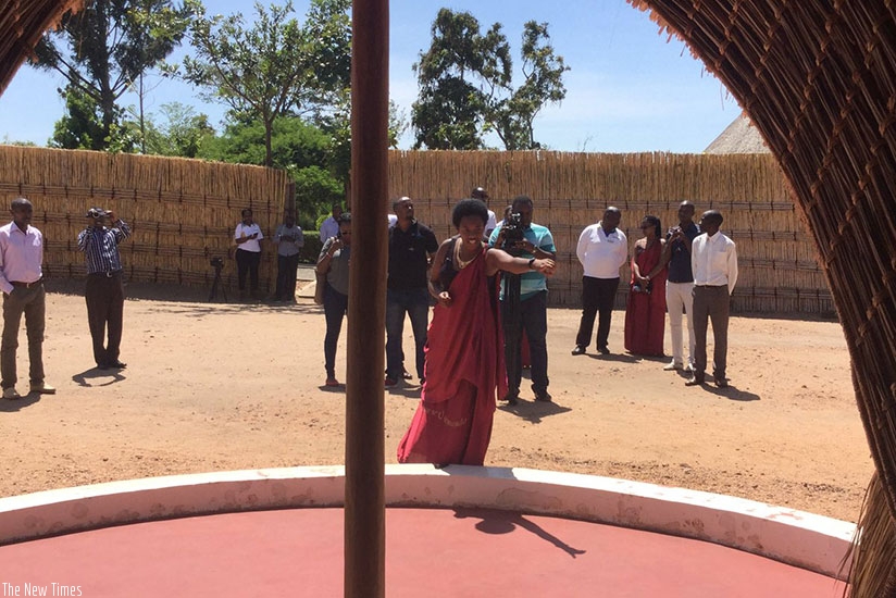 Visitors being shown around at the former King's Palace-Rukari museum on Friday. Athan Tashobya. 