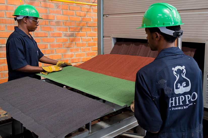 Employees of Hippo monitoring the production line. Industries in the region are seeking support to become competitive and create jobs. / Timothy Kisambira