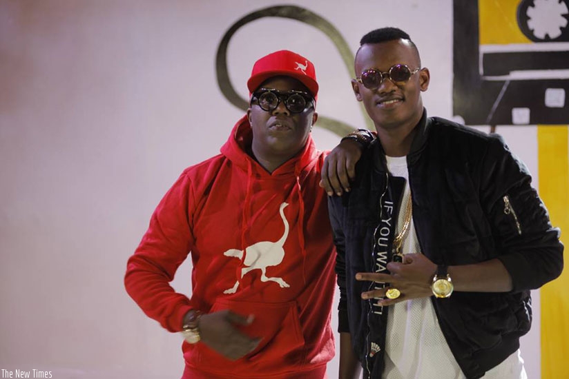Tanzanian bongo flava artiste A.Y (L) with Rwandan R&B singer Yvan Buravan. (Courtesy photos)
